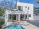 Modern house with rooftop deck and covered patio at 2430 Floyd St, Sarasota, FL 34239