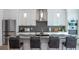 Modern kitchen with stainless steel appliances and an island at 2430 Floyd St, Sarasota, FL 34239
