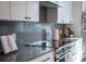 Modern kitchen with stainless steel appliances and sleek countertops at 2430 Floyd St, Sarasota, FL 34239