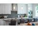 Modern kitchen with stainless steel appliances and an island at 2430 Floyd St, Sarasota, FL 34239