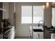 Modern kitchen with stainless steel appliances and an island at 2430 Floyd St, Sarasota, FL 34239