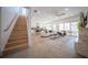Open living area with stairs, kitchen, and patio access at 2430 Floyd St, Sarasota, FL 34239