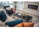 Bright living room features a fireplace and view of the pool at 2430 Floyd St, Sarasota, FL 34239