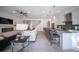Open floor plan with kitchen, living room, and breakfast bar at 2430 Floyd St, Sarasota, FL 34239