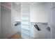 Spacious walk-in closet with ample shelving and hanging space at 2430 Floyd St, Sarasota, FL 34239