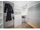 Large walk-in closet with ample shelving and hanging space at 2430 Floyd St, Sarasota, FL 34239