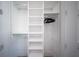 Large walk-in closet with ample shelving and hanging space at 2430 Floyd St, Sarasota, FL 34239