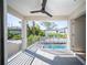 Private balcony overlooking the backyard pool and lush landscaping at 2446 Floyd St, Sarasota, FL 34239