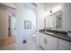 Small bathroom with single vanity and toilet at 2446 Floyd St, Sarasota, FL 34239