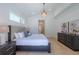 Bright bedroom with king-size bed and light wood floors at 2446 Floyd St, Sarasota, FL 34239