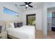 Light-filled bedroom with queen bed and ensuite bath at 2446 Floyd St, Sarasota, FL 34239
