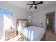 Bright bedroom with sliding door to balcony and hardwood floor at 2446 Floyd St, Sarasota, FL 34239