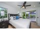 Bright bedroom with private balcony access and modern decor at 2446 Floyd St, Sarasota, FL 34239