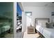 Bright bedroom with sliding door to balcony and hardwood floor at 2446 Floyd St, Sarasota, FL 34239