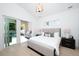 Main bedroom with pool access and outdoor kitchen at 2446 Floyd St, Sarasota, FL 34239