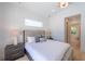 Spacious bedroom with large bed and en-suite bathroom at 2446 Floyd St, Sarasota, FL 34239