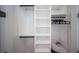 Spacious walk-in closet with ample shelving and hanging space at 2446 Floyd St, Sarasota, FL 34239