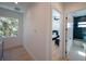 Hallway with access to bedroom and bathroom at 2446 Floyd St, Sarasota, FL 34239