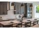 Modern kitchen with island, dark cabinets, and quartz countertops at 2446 Floyd St, Sarasota, FL 34239