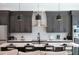 Modern kitchen with dark cabinets, quartz countertops and island at 2446 Floyd St, Sarasota, FL 34239