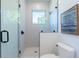 Modern shower with glass enclosure and subway tile at 2446 Floyd St, Sarasota, FL 34239