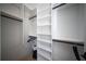 Large walk-in closet with ample shelving and hanging space at 2446 Floyd St, Sarasota, FL 34239
