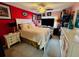 Bright bedroom with a queen-size bed and plenty of storage at 4419 Muirfield Dr, Bradenton, FL 34210