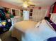 Spacious bedroom with large dresser and mirrored closet doors at 4419 Muirfield Dr, Bradenton, FL 34210