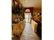 Elegant entryway with decorative console table and view of backyard at 4419 Muirfield Dr, Bradenton, FL 34210