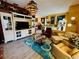 Relaxing living room with large TV and comfortable seating at 4419 Muirfield Dr, Bradenton, FL 34210