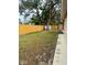 Backyard with shed and wooden fence at 4709 Foy Pl, Sarasota, FL 34243