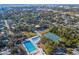 Aerial view of community pool and tennis courts at 2420 Floyd St, Sarasota, FL 34239