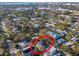 Aerial view highlighting a modern home's location in a residential area at 2420 Floyd St, Sarasota, FL 34239