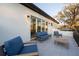 Relaxing balcony with seating area and glass doors at 2420 Floyd St, Sarasota, FL 34239