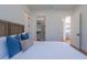 Bright bedroom with walk-in closet and plush bedding at 2420 Floyd St, Sarasota, FL 34239