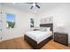 Cozy bedroom with hardwood floors and ample natural light at 2420 Floyd St, Sarasota, FL 34239