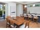 Modern kitchen with island, stainless steel appliances, and hardwood floors at 2420 Floyd St, Sarasota, FL 34239