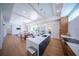 Spacious kitchen with island, stainless steel appliances & hardwood floors at 2420 Floyd St, Sarasota, FL 34239