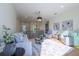 Bright living room with comfy seating and large windows at 2420 Floyd St, Sarasota, FL 34239
