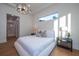 Bright main bedroom with hardwood floors and ensuite access at 2420 Floyd St, Sarasota, FL 34239