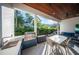 Relaxing outdoor patio with seating area and built-in grill at 2420 Floyd St, Sarasota, FL 34239