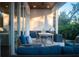 Covered patio with outdoor kitchen and seating at 2420 Floyd St, Sarasota, FL 34239