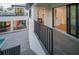 Private balcony overlooking the backyard pool and patio at 2440 Floyd St, Sarasota, FL 34239