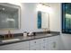 Elegant bathroom with double vanity, marble tile, and soaking tub at 2440 Floyd St, Sarasota, FL 34239
