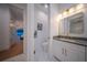 Stylish bathroom with single vanity and marble flooring at 2440 Floyd St, Sarasota, FL 34239