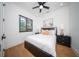 Bright bedroom with hardwood floors and ceiling fan at 2440 Floyd St, Sarasota, FL 34239