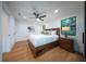 Bright bedroom with hardwood floors and ample light at 2440 Floyd St, Sarasota, FL 34239