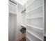 Spacious walk-in closet with ample shelving and hanging space at 2440 Floyd St, Sarasota, FL 34239
