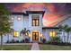Stunning two-story home with a modern design and landscaped yard at 2440 Floyd St, Sarasota, FL 34239