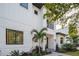 Stylish two-story home with white exterior and black windows at 2440 Floyd St, Sarasota, FL 34239
